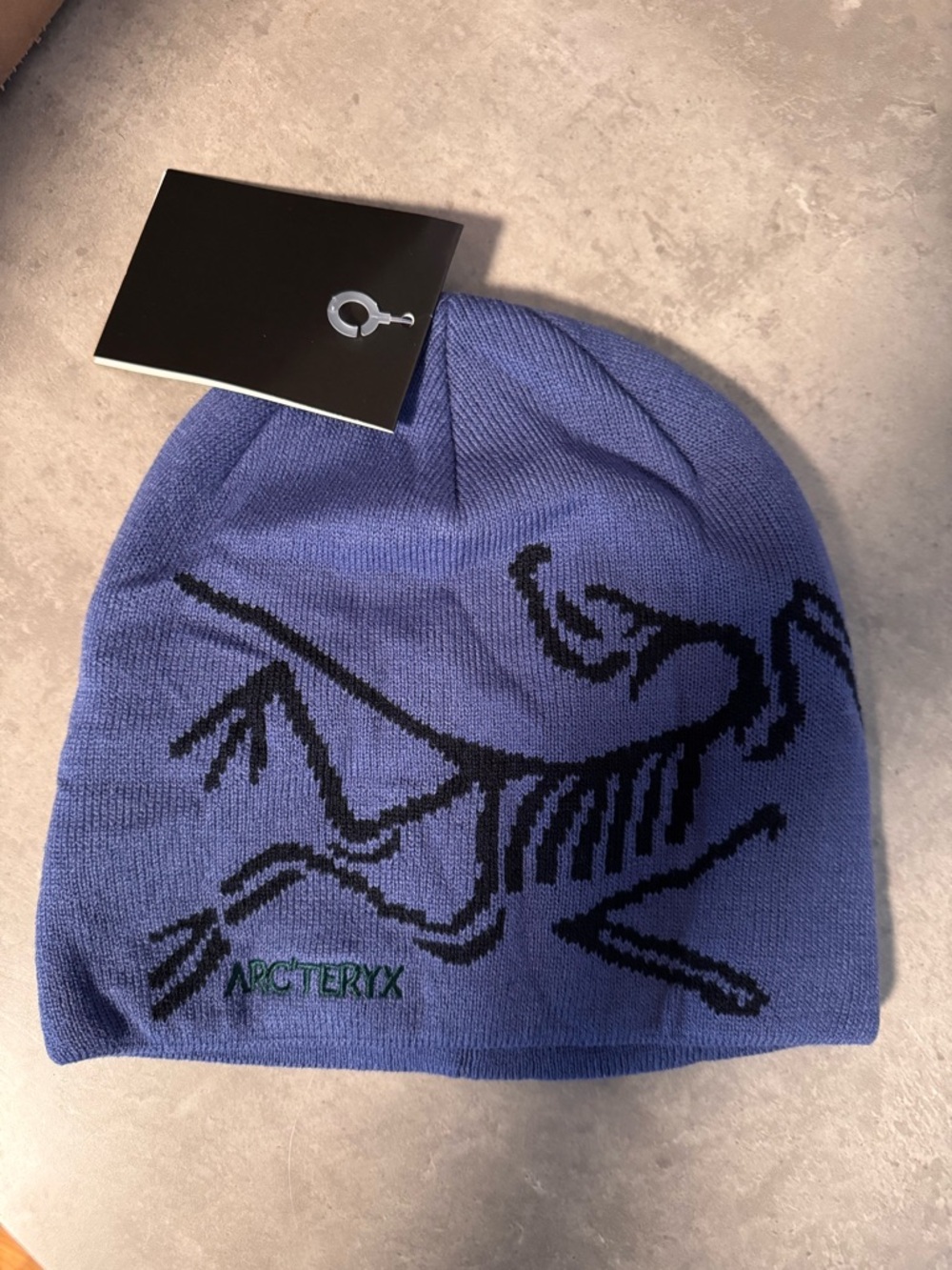 Arc'teryx Blue Beanie with Black Skeleton Motif
